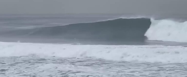 large size wave breaking right in hermosa beach winter 2023